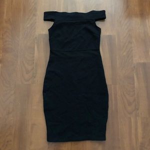 Black off the shoulder form fitting dress